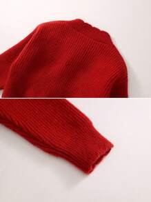 1 件年轻女孩红色针织开衫，带蝴蝶结细节，秋冬季，圣诞节