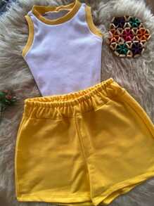 Fabi Set, The Perfect Combination Of High-Waisted Shorts And A Two-Tone Blouse, Which Brings A Touch Of Fashion And Elegance With Maximum Comfort! - Màu vàng - Xem 2