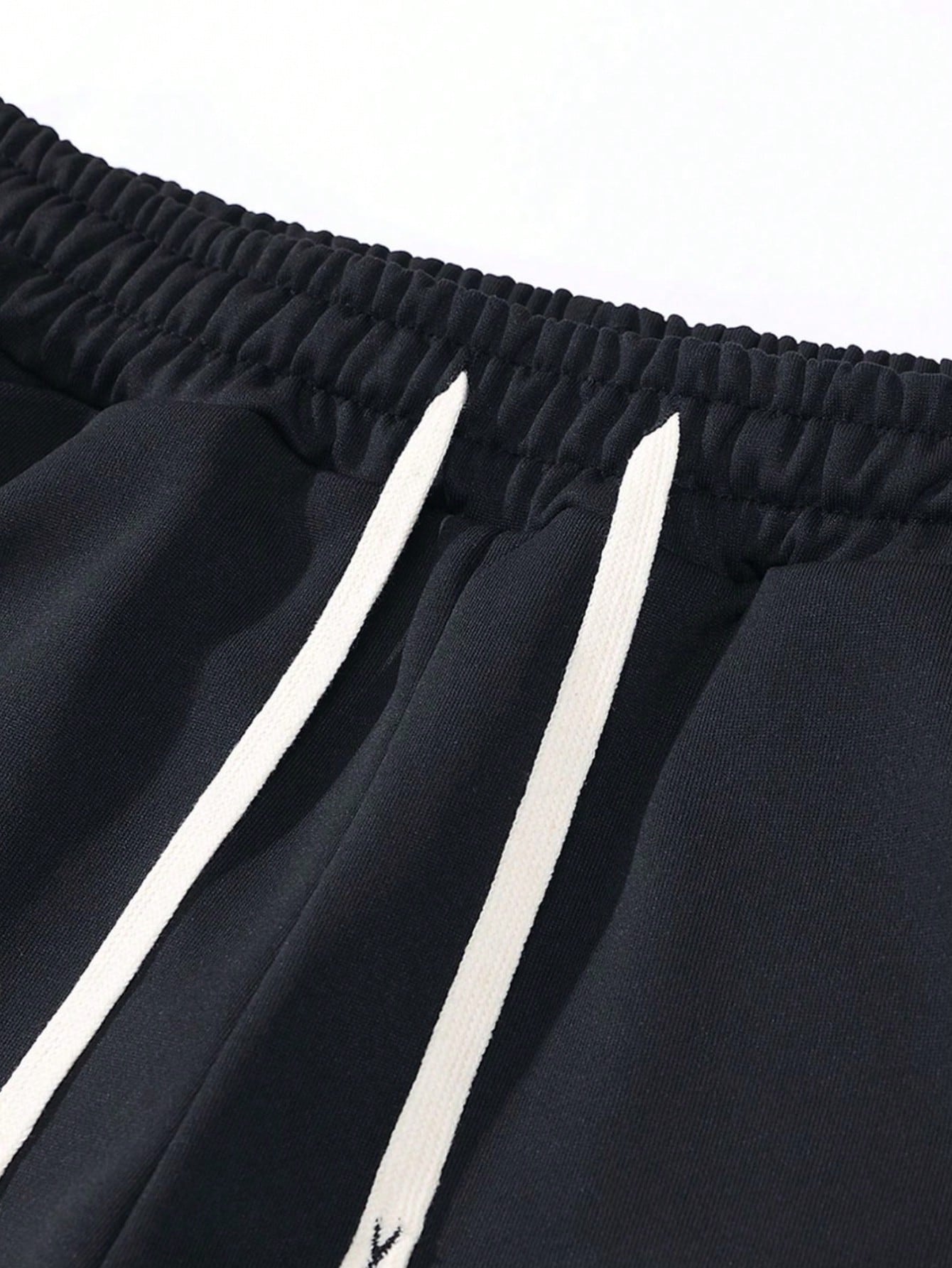 مجموعة رجالية قطعتين عبارة عن هوديي وبنطلون ذو لون...