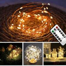 1 Gói, Dây đèn đồng 100 đèn LED 10M chạy bằng pin 3AA, Điều khiển từ xa, Chống thấm nước, 8 chế độ nhấp nháy, Trắng ấm 100 đèn LED, Thích hợp cho Giáng sinh, Tiệc sinh nhật, Cây thông Noel, Trang trí hộp quà - ánh sáng trắng ấm áp - Xem 5