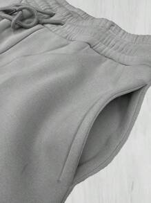 Pantalones deportivos casuales básicos con cordón en la cintura y puños para hombre, para correr al aire libre en primavera y otoño - Gris Claro - Ver 3