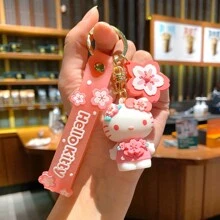 Sanrio Porte-clés figurine Kawaii Anime Fleurs de cerisier Sakura mignon pour fille. Accessoire pour Noël, voiture, sac à dos d'école, cadeau