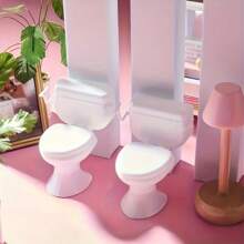1 Stück charmante Miniatur-Toiletten-Deko - aus weißem Kunststoff, manuelles Kippdesign für Badezimmer-Ausstellungsdekoration, weißer Elefant Gag-Geschenk, über der Toilette, Miniaturfiguren