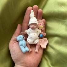 1 pieza 3,15 pulgadas/8 cm muñeca bebé Reborn de silicona hecha a mano, muñeca de silicona de piel pintada suave y flexible, muñeca Reborn realista impermeable y con apariencia de vida real, se puede bañar, regalo de cumpleaños - Multicolor - Ver 13