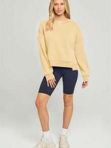 Camiseta deportiva corta de silueta grande para mujer, sudadera con capucha de color liso para ocio de mujer