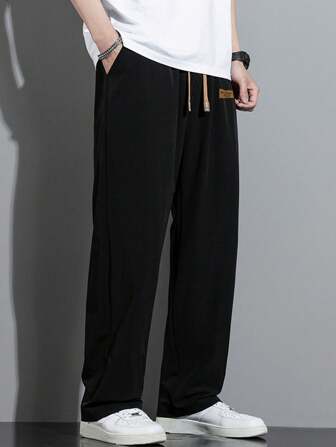 Men's Relaxed Fit Drawstring Waist Slant Pocket Solid Color Pants, Fall