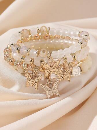4pcs Bohemian Handmade Glass Bead Flower Bud & Butterfly Charm Elastic Bracelet Set For Women, Beach Holiday Style, Random Design