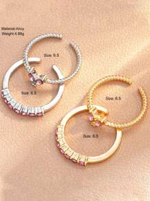 Set de 4 anillos ajustables con diseño de mariposa y corazón de cristal en tonos dorado y plateado, joyería para niña