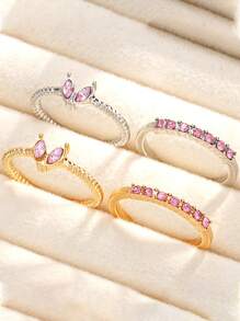 Set de 4 anillos ajustables con diseño de mariposa y corazón de cristal en tonos dorado y plateado, joyería para niña