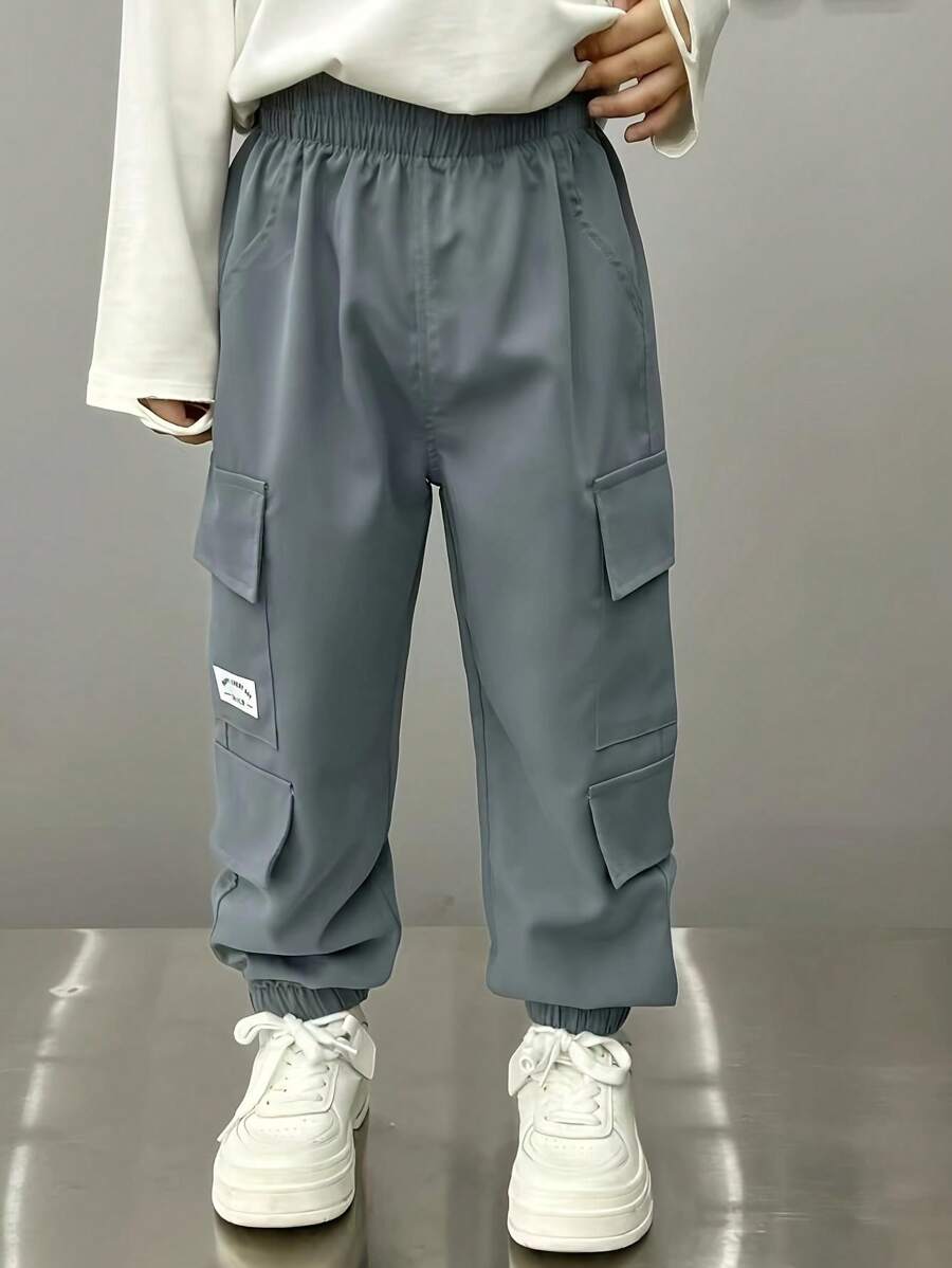 Pantalon cargo pour jeune garçon avec poches multiples, pantalon de travail à la mode pour usage quotidien, toutes saisons - Gris - Voir 1