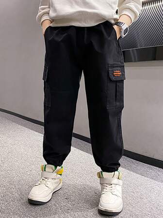 Boys & Teenagers Casual Solid Color Fashionable Simple Multi-Pocket Cargo Pants With Cuffed Bottom