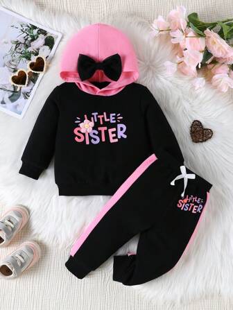 休闲舒适运动字母印花蝴蝶结装饰长袖连帽衫+松紧腰撞色拼接九分裤女童运动套装