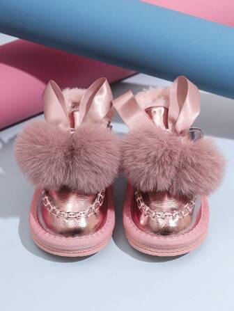 Ett par flickstövlar för barn, flickläder med plyschisolering, korta flickstövlar, vinterstövlar för studenter