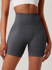 Pantalones cortos deportivos elásticos de un solo color y sin costuras que levantan el trasero, apropiados para correr, entrenar y hacer yoga