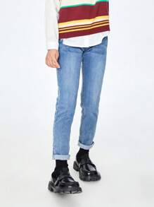 Annil Jeansy dla dzieci Tween Girl. Spodnie jeansowe z haftem w słodkie kwiaty i pełną talią. Jesienne proste i swobodne jeansy z włókien roślinnych