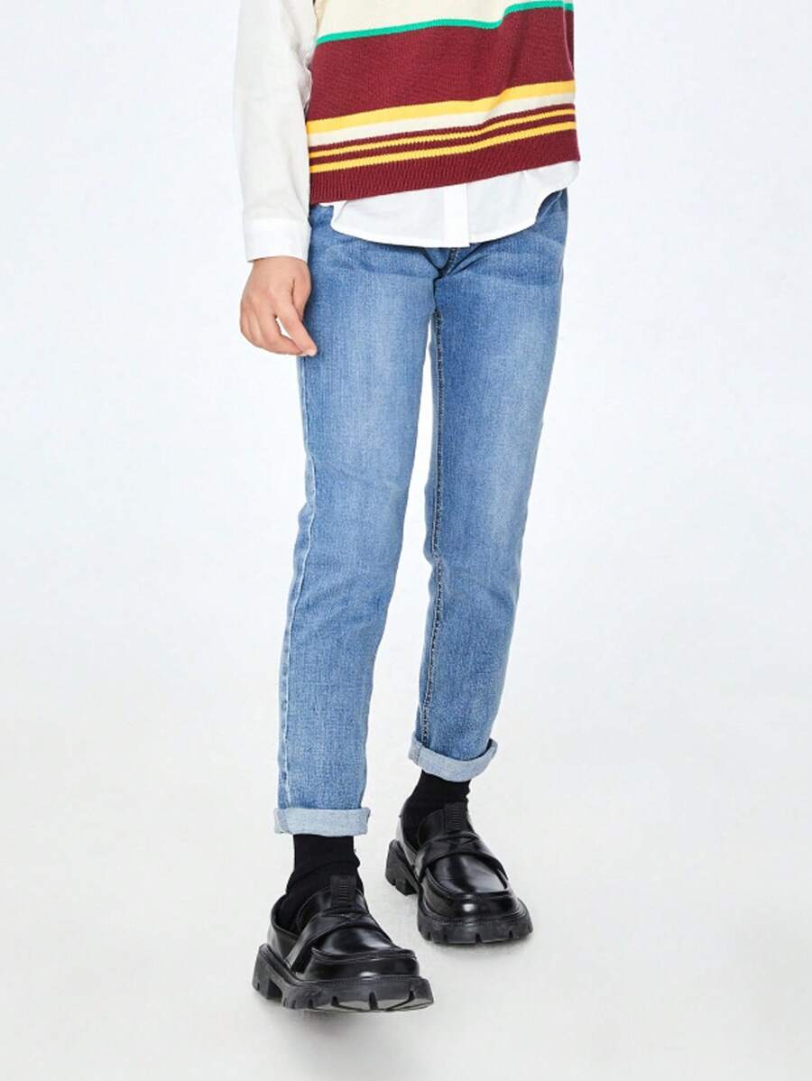 Annil Jeansy dla dzieci Tween Girl. Spodnie jeansowe z haftem w słodkie kwiaty i pełną talią. Jesienne proste i swobodne jeansy z włókien roślinnych