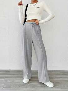 Pantaloni casual in tinta unita a vita alta con coulisse e gamba dritta