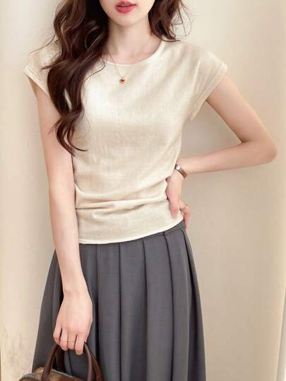 Top de malha plissada de manga curta