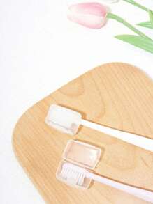 1/2/4/8/10 pièces Étui de protection transparent portable pour tête de brosse à dents, doux et protecteur pour la brosse à dents. Accessoire essentiel pour la salle de bain. Étui de transport portable pour brosse à dents. Capuchon de protection d'hygiène pour brosse à dents. Fournitures pour l'extérieur pour le voyage, la randonnée, le camping. Organisateur d'accessoires de salle de bain pour la maison. Gadgets de voyage essentiels. Fournitures scolaires. Accessoires de vacances, d'été et de plage. Mini parfum pour femmes et hommes. Accessoires de voyage.