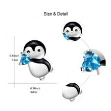可愛的企鵝拿著藍色心形耳釘,送給女人和女孩的生日和聖誕節禮物