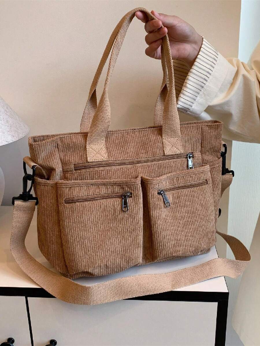 时尚简约大容量多口袋单肩手提包，适合上学、工作、旅行，可用作公文包