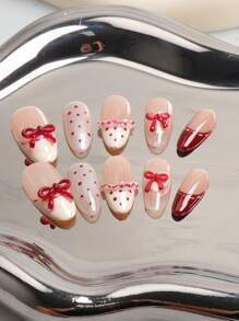 10件套可爱猫眼蝴蝶结手工美甲贴纸套装，高端可爱风格，适合作为情人节礼物或其他节日礼物。美甲贴纸，美甲用品，美甲产品。