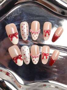 10件套可爱猫眼蝴蝶结手工美甲贴纸套装，高端可爱风格，适合作为情人节礼物或其他节日礼物。美甲贴纸，美甲用品，美甲产品。