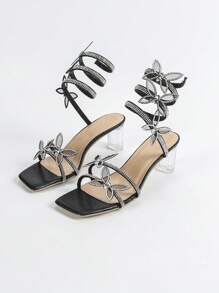 女士水钻和珍珠装饰性感尖头高跟凉鞋，采用蛇纹设计和缠绕带，适合夏季派对 - 黑色 - 查看 8