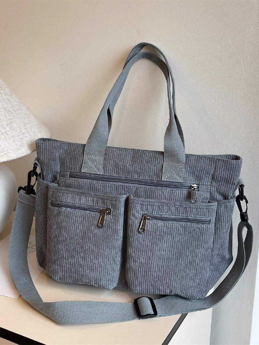 大容量时尚简约单肩手提包，带多个口袋，适合上学、工作、通勤和旅行