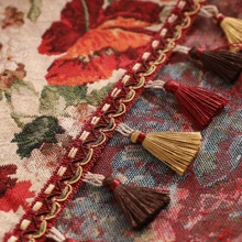 1 件带流苏的提花花卉图案黑色桌布