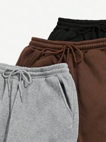 纯色保暖内衬运动裤三件套。舒适凉爽，活力无限的纯色保暖内衬运动裤三件套。三件套运动时尚套装适合秋冬季休闲运动、跑步、聚会和派对。简约三件套。 - 彩色 - 查看 5