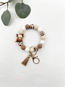 1 pieza Brazalete/Llavero/Colgante de bolso con estilo bohemio, con cuentas de silicona de vaca con estampado de vaca y borla, regalo para amigos, accesorios de coche, encanto de bolso, mochila para la escuela, gótico lindo Y2k