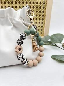 1 pieza Brazalete/Llavero/Colgante de bolso con estilo bohemio, con cuentas de silicona de vaca con estampado de vaca y borla, regalo para amigos, accesorios de coche, encanto de bolso, mochila para la escuela, gótico lindo Y2k