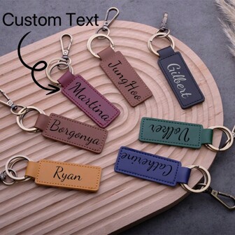 [Customized] 1pc Engraved Name PU Leather Keychain, Personalized Name Phone Tag, Anti-Lost, Perfect Gift For Valentine's Day, Christmas, Mother's Day, Bridesmaid/Groomsman Gift, Vintage Design, Multifunction, Lightweight, All-Purpose, Solid Color, Dopamine Style, Business Casual, Commuting, Leisure, Vintage, Cute, Contracted, Funny, Vacay Vibes/Vacation, Ideal Gifts For Him, Ideal Gifts For Her, Women, Rookies & White-Collar Workers, Children, Friends, Family, Girlfriend, Boyfriend, Her, Customized Bag Accessories, Street Casual Chic, New Year Glamour