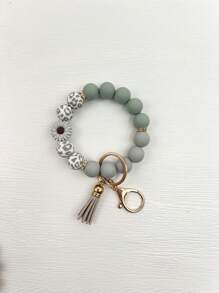 1 pieza Brazalete/Llavero/Colgante de bolso con estilo bohemio, con cuentas de silicona de vaca con estampado de vaca y borla, regalo para amigos, accesorios de coche, encanto de bolso, mochila para la escuela, gótico lindo Y2k