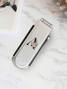 1 pièce Miroir de maquillage et de cheveux 2-en-1 pliable - Portable, de table, lettres noires fleuries A-Z, outil de beauté contemporain pour voyager. Peigne pliant avec miroir de maquillage, facile à transporter, parfait pour les voyages, les sorties, l'utilisation. Peigne à coussin d'air double usage, accessoire de massage du cuir chevelu, produit de voyage, fournitures scolaires, accessoires de vacances essentiels - Argent - Voir 6
