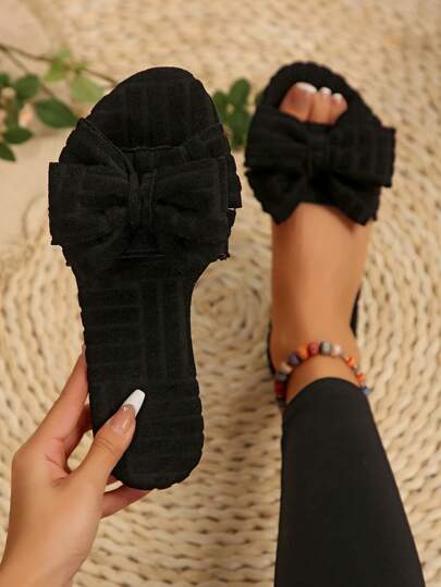 女士东南亚蝴蝶结休闲纯色法兰绒平底一脚蹬露趾家居拖鞋，秋冬欧美风格