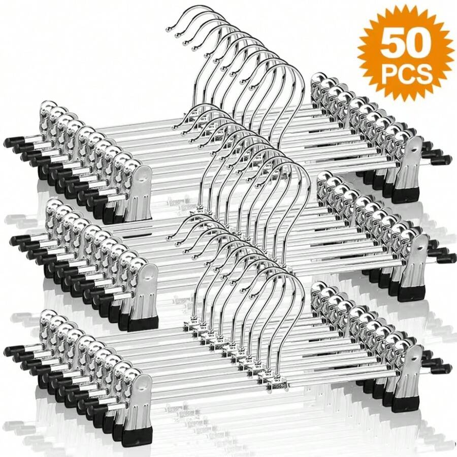 50PCS Estantería de pantalones Ganchos para Pantalones con Clip Perchas para Ropa 30CM Metal Ligero Resistent Antideslizantes Duradera Ajustables con Gancho Giratorio Perchas para Faldas Jeans Adultos Hogar,Perchas para Pantalones con Clip - Antideslizantes con Clips Ajustables Que no Deja Marcas Perchas de Metal Resistente Pantalones con Gancho Giratorio Perchas para Faldas y Jeans Organizador de Armario - Plateado - Ver 1