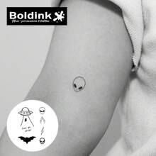 Boldink 非永久性纹身技术。灵感来自外星人、不明飞行物、蝙蝠的设计。入门级纹身。生动逼真。防水临时纹身可持续 1-2 周。自然哑光效果。易于使用。临时纹身的完美选择。 - 黑色 - 查看 4