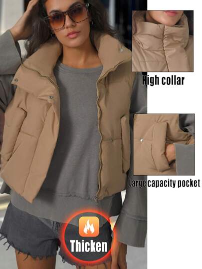 Damska jednokolorowa kamizelka na jesień i zimę. Stójka, krótki fason, oddychająca, wyściełana kamizelka.