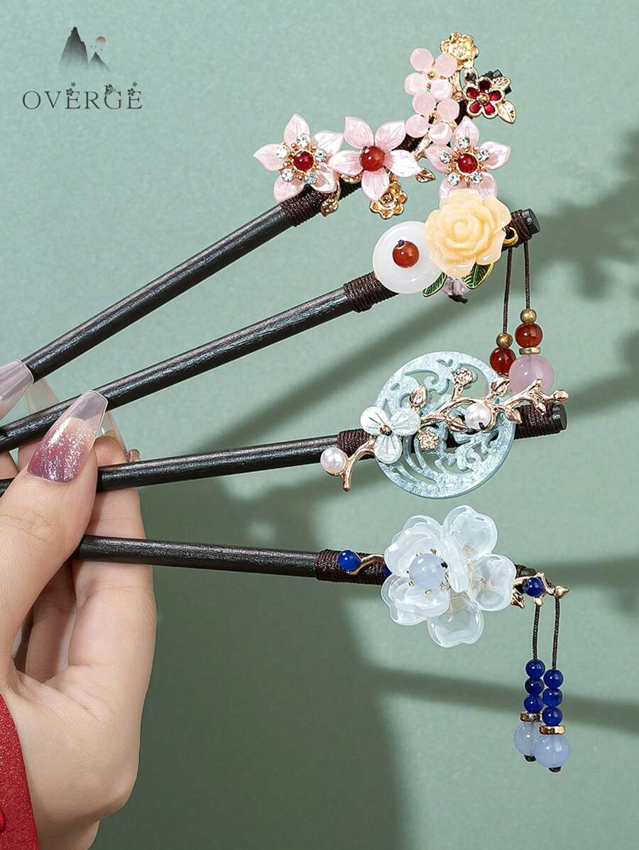 六件套新款中式3D木质发簪,包括粉色五瓣樱花、蓝色圆月、彩色花朵、牡丹花、金色3D小兔子、绿叶装饰和串珠流苏饰品。复古宫廷风发簪,适合搭配汉服、旗袍,打造优雅的日常及派对发髻,也可用作发髻器、发饰、发饰、情人节配饰、女士发饰,春季必备。 - 彩色 - 查看 1