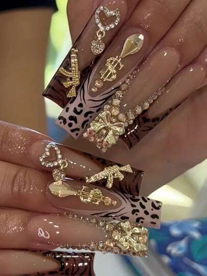 24Pcs Long Coffin Nail Patch Gold Glitter Powder Leopard Print French Three-Dimensional Gold Flash Drill Gold Bow Drill Asymmetrical Gold Drill 3D Gold Drill Love Pendant Drill Cool Gun Metal Drill Press-On Nails Suit (With: A Piece Of Jelly Glue 1 Root Rubbing Strip) Suitable For Women'S Daily Date Party Party Press On Nails Nail Supplies Nails