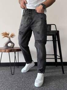 Jeans de mezclilla negro distressed y lavado casual y sencillo