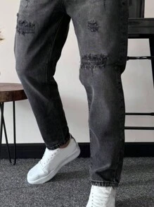 Jeans de mezclilla negro distressed y lavado casual y sencillo