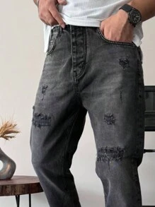 Jeans de mezclilla negro distressed y lavado casual y sencillo