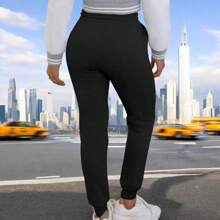 JOGGER AFELPADO LISO CASUAL CON BOLSAS IDEAL PARA TODO TIPO DE ACTIVIDAD     (F1B) - Negro - Ver 3