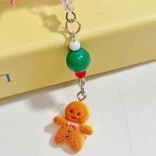 Thiết kế mới Phong cách Giáng sinh Nơ Colorblock Quà tặng ngày lễ Người bánh gừng Trang trí Giáng sinh Làm thủ công Hạt cườm Dễ thương Bùa hộ mệnh cổ điển, Dây đeo điện thoại, Mặt dây chuyền điện thoại - Dây buộc điện thoại di động hình người đàn ông bánh gừng giáng sinh - Xem 6