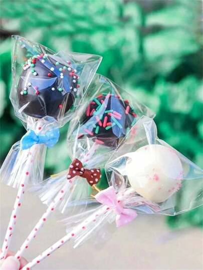 100 unidades de Bolsas de empaque para piruletas, bolsas planas de material de PP transparente para empacar piruletas, suministros escolares, fiestas y vacaciones, bolsas para dulces, chocolates, galletas y otros alimentos.