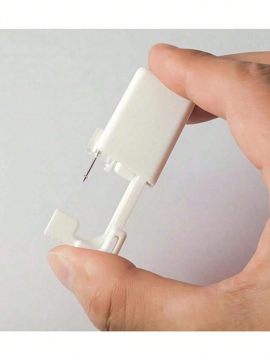 7Piece Nose Piercing Kit BuiltIn Piercing Gun With 20G Nose Studs