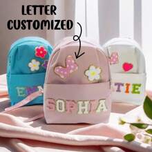 圣诞老人秘密礼物，个性化圣诞字母印花背包，旅行和露营背包 - 彩色 - 查看 2